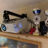 My projector and my pool trophies 